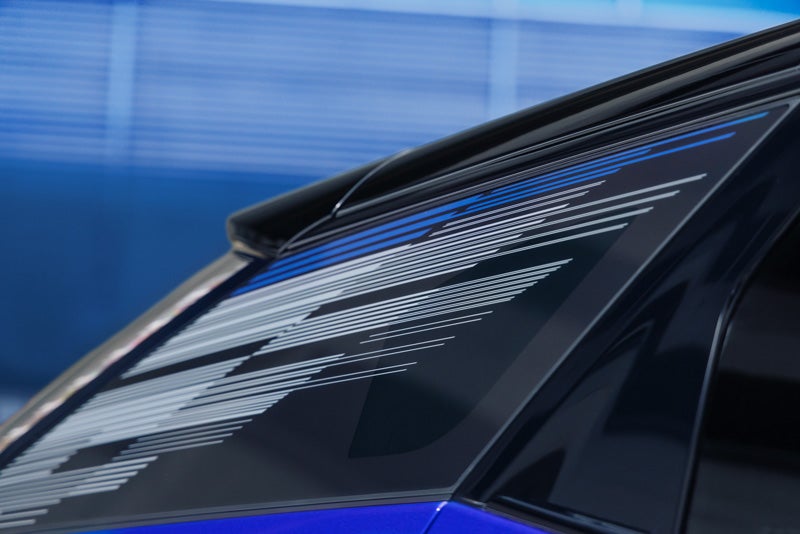 Close-up of the Modern Pattern on the 2026 OPTIQ-V Rear Quarter Glass | Joe Cooper Chevrolet in Shawnee OK
