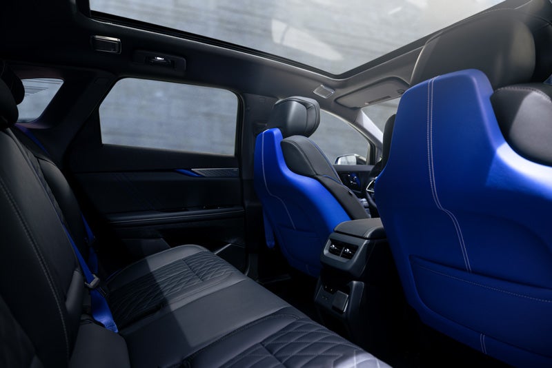 Back Seat View of the 2026 OPTIQ-V Blue Front Seats, Sun Roof, and Interior | Joe Cooper Chevrolet in Shawnee OK